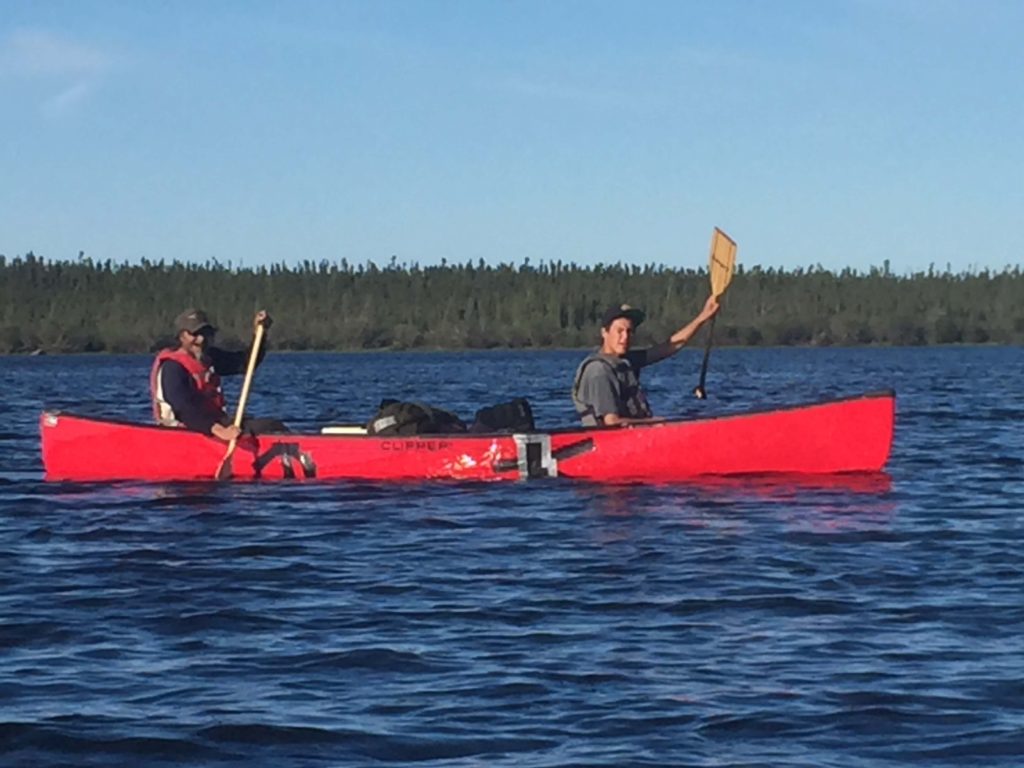 two men in canoe on seal river