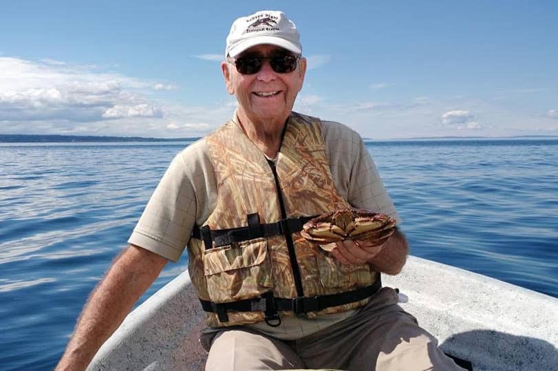 Harvey Williams in a boat.