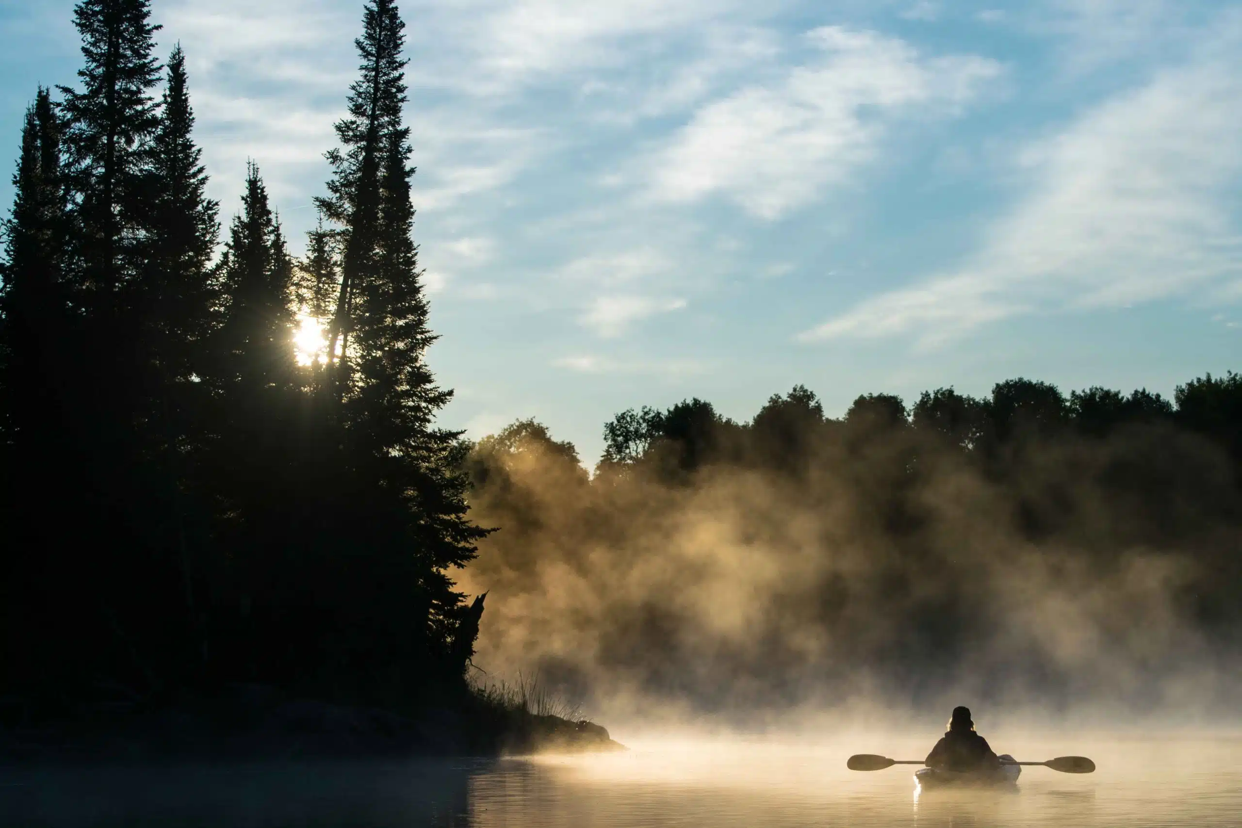 Kayaker at sunset