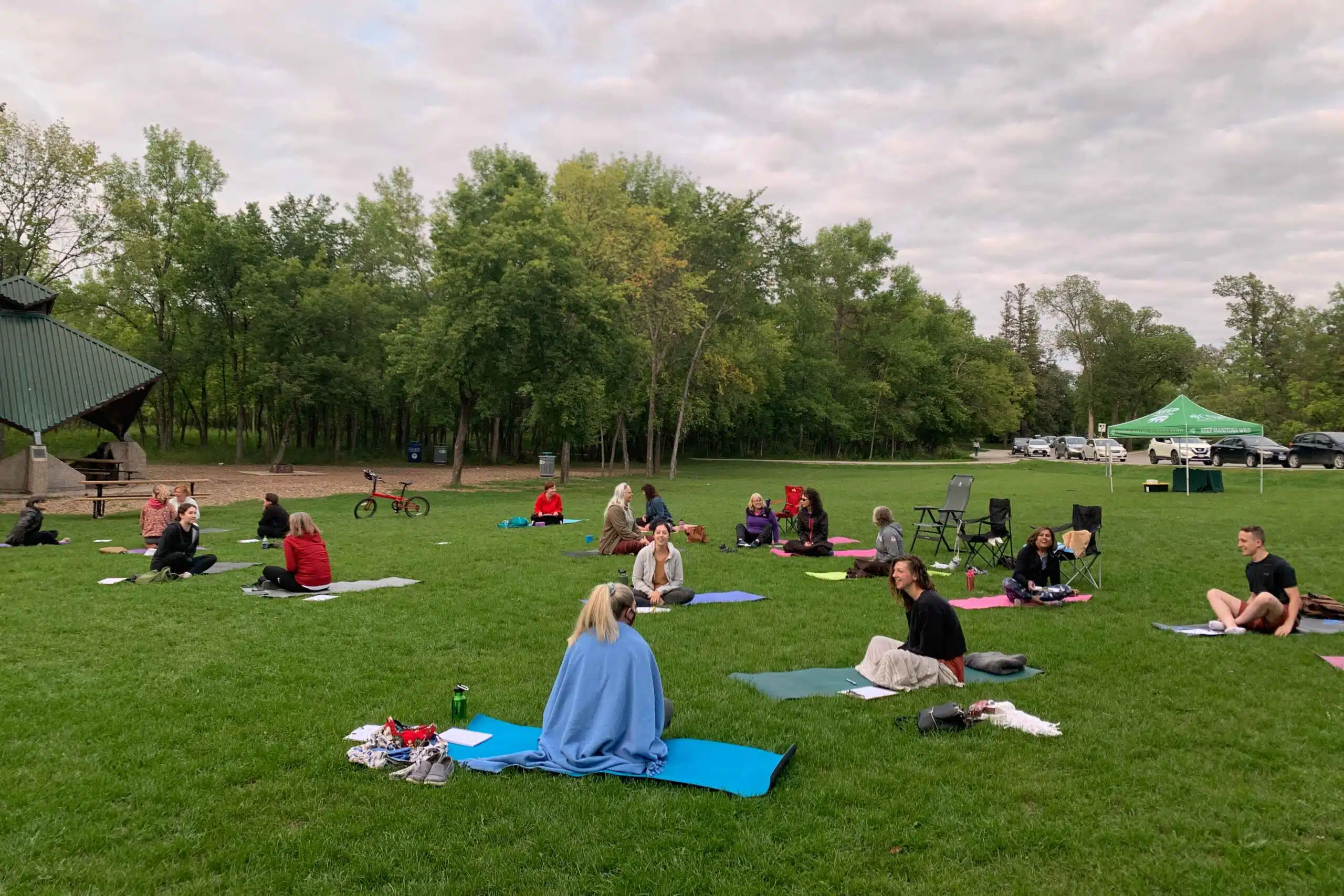 Group of people at a CPAWS Manitoba workshop at Assiniboine Park.