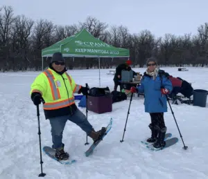 Stella and Ken wearing snowshoes at a CPAWS Nature Club event 