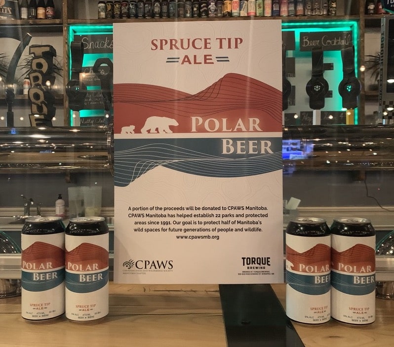 Cans of polar beer, a CPAWS Manitoba and Torque Brewing collaboration