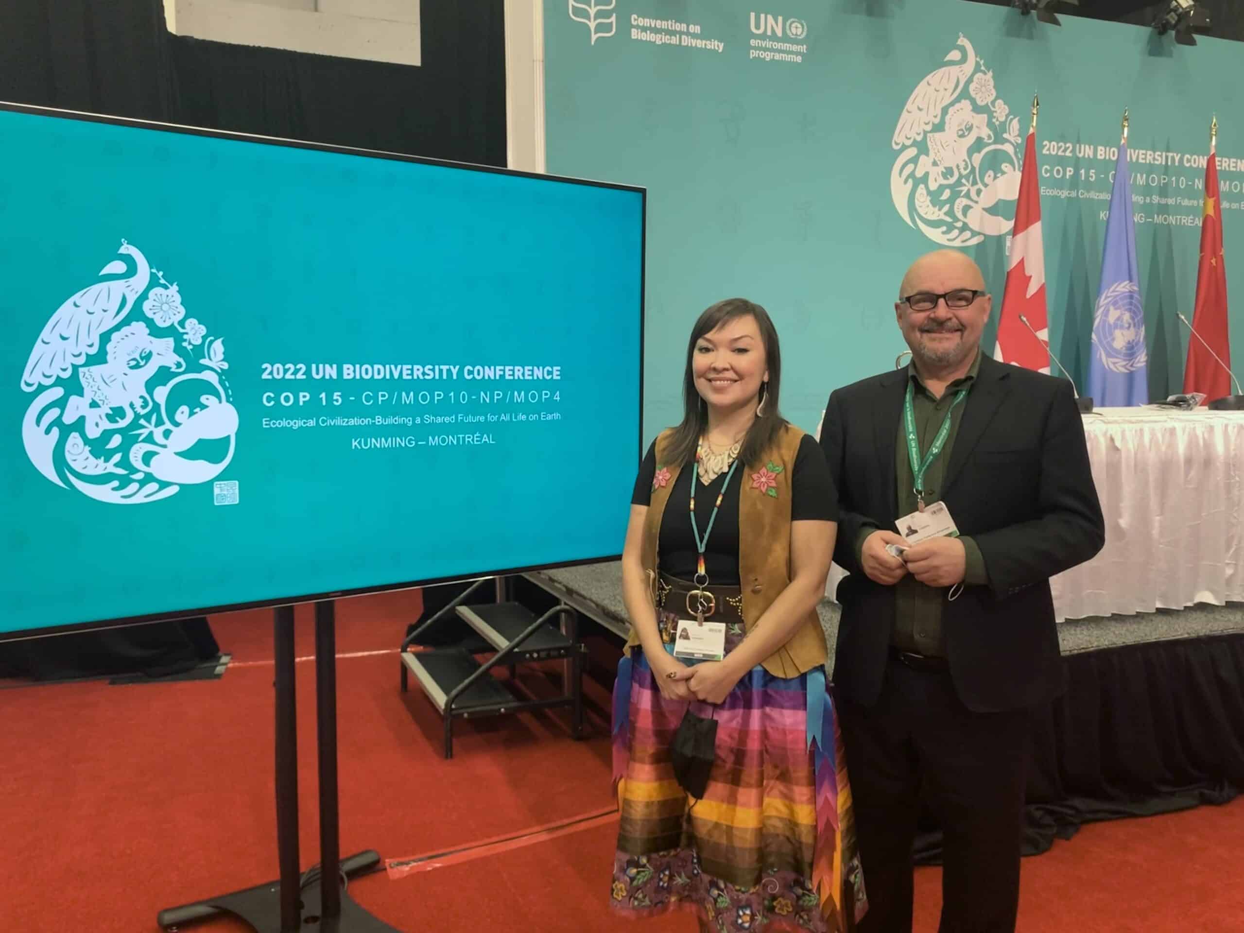 Seal River Watershed Alliance Executive Director Stephanie Thorassie stands CPAWS Manitoba Executive Director Ron Thiessen following the announcement of a joint feasibility assessment during the COP15 UN Conference on Biological Diversity in Montreal on December 14, 2022