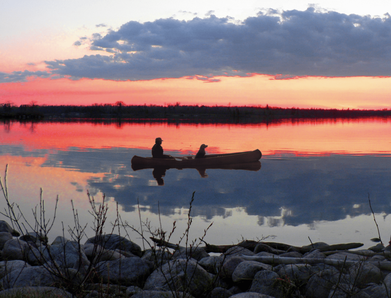 Photo-Person-and-dog-on-boat-photo-ron-thiessen