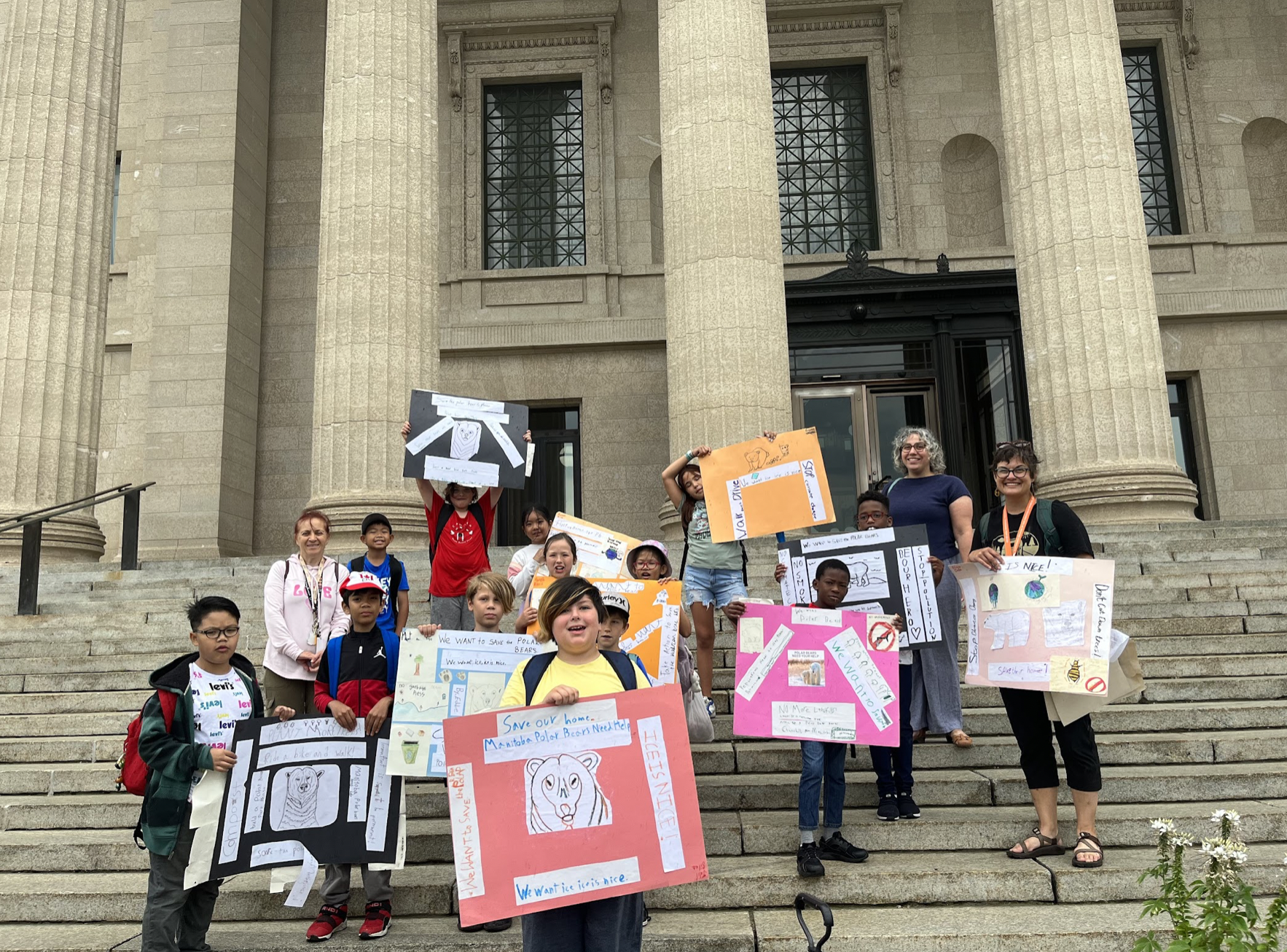 Children carrying posters and handwritten letters asking the Manitoba government to protect polar bears met with Environment and Climate Minister Kevin Klein in the legislature on one the last days of the school year.