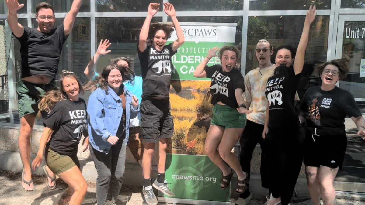 CPAWS Manitoba outreach staff jump for joy