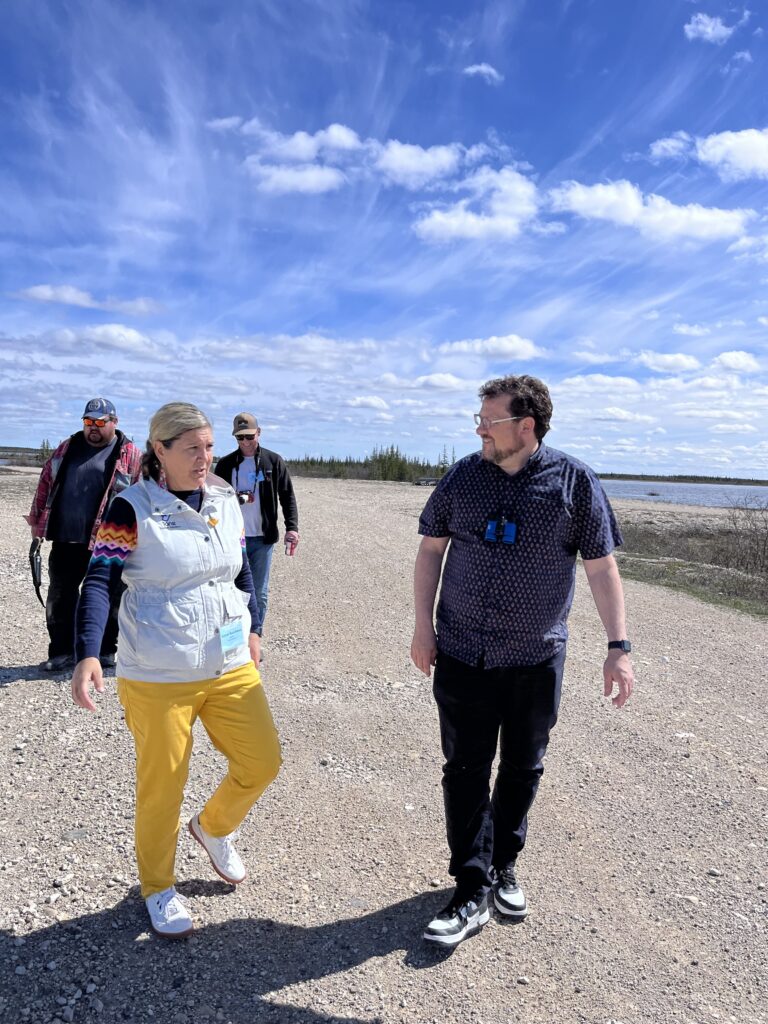 Darcie Guarderas of Indigenous Tourism Manitoba and Minister of Sport, Culture, Heritage and Tourism Glen Simard explore the lands near the Churchill Northern Studies Centre after speaking about the value of Churchill's tourism industry and the growth in demand for Indigenous tourism opportunities in June 2024. Credit Mira Oberman, CPAWS Manitoba