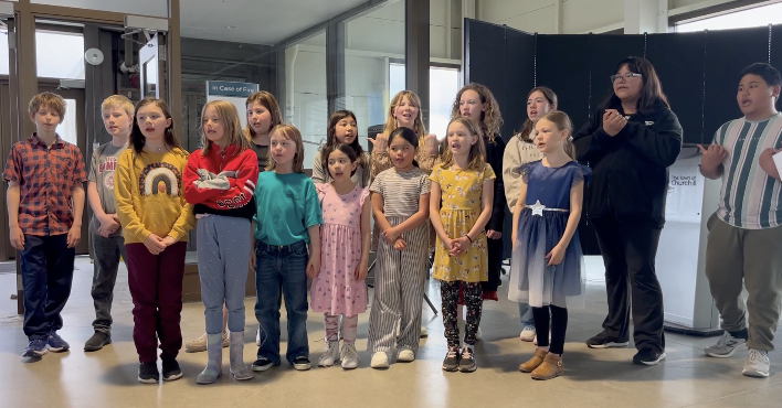 The Churchill Northern Lights school choir brought smiles to the faces of about 125 people gathered for a Birds, Bears and Belugas party in June 2024. Credit Mira Oberman, CPAWS Manitoba