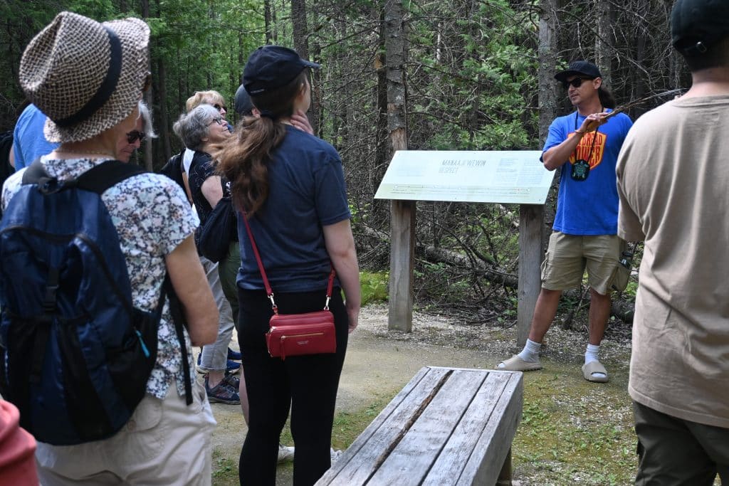 Dylan Kensick sharing knowledge on Brokenhead Interpretive Trail