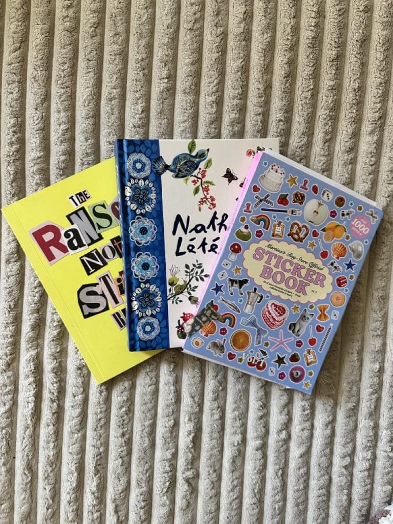 Sticker books for journaling, including "The Ransom ote Sticker Book," "Nathalie Lete Sticker Book," and "Martina's Tiny Store Official Sticker Book."